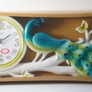 wall clock with peacock white green and blue shades